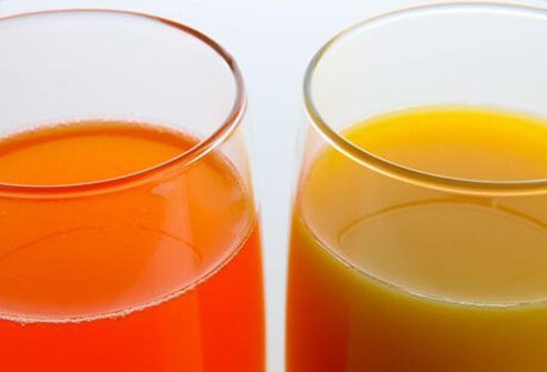 Two glasses of fruit juice.