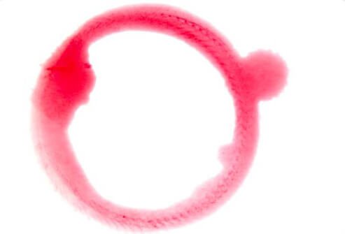 A stain from a glass of red wine.