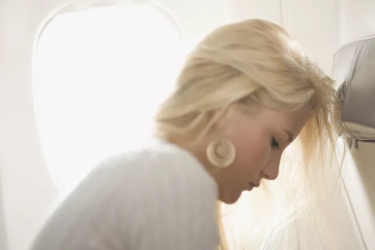 Young Woman on an Airplane